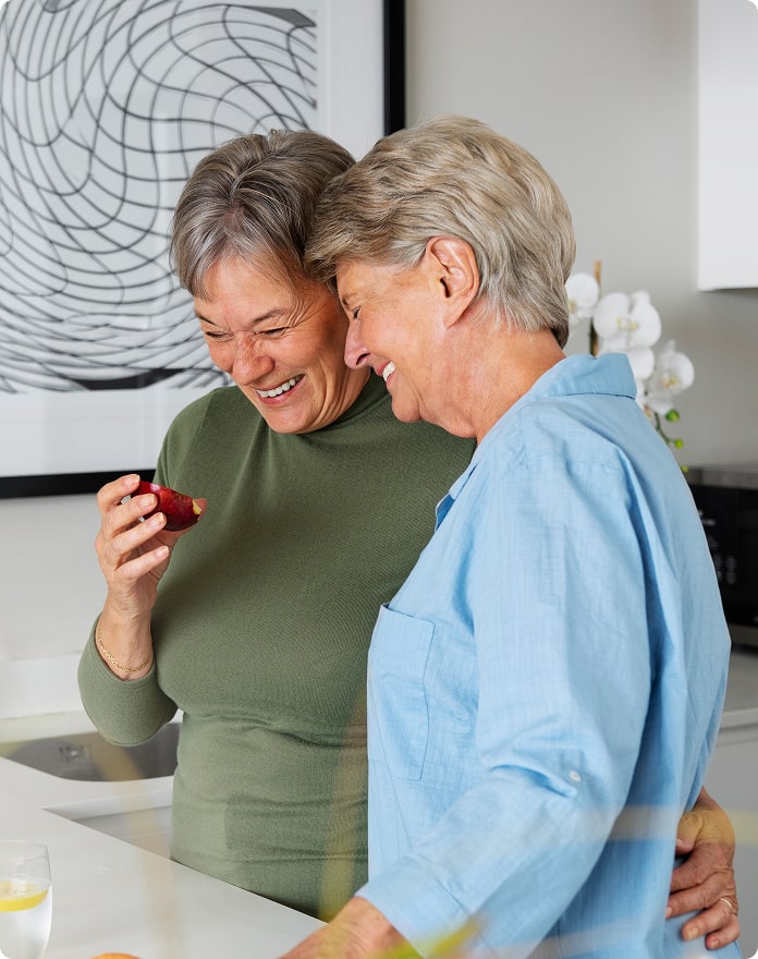 Two smiling Cremation Club members